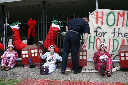 Police at Homes for the Holidays demonstration